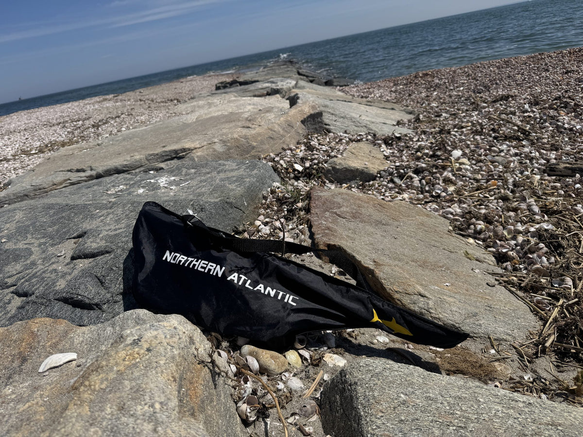 Northern Atlantic combo bag on a jetty